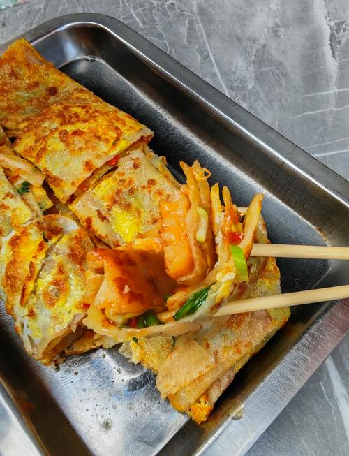 鸡西小吃街有哪些特色美食值得探秘？